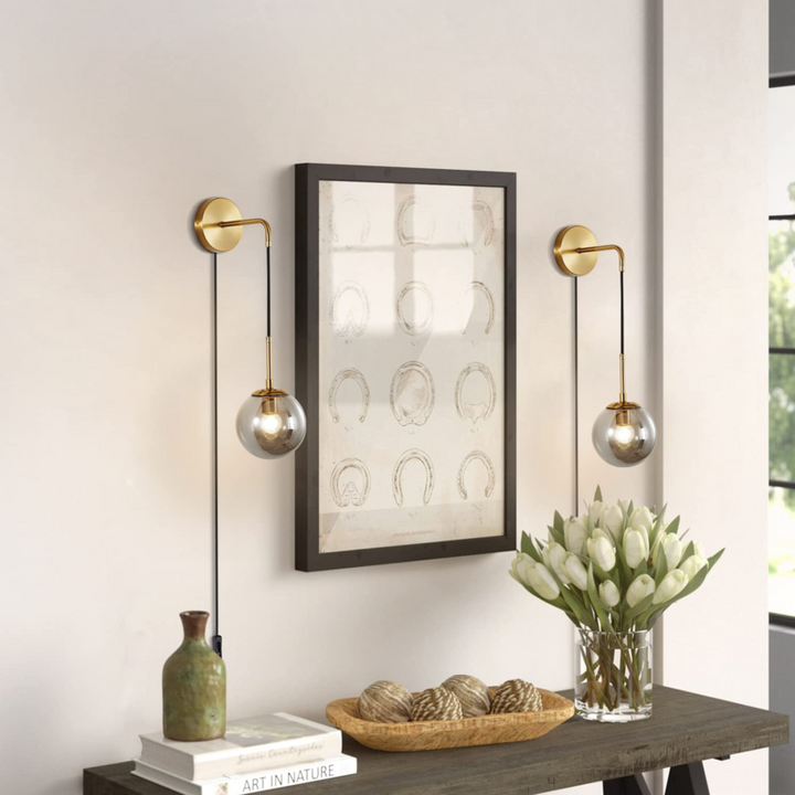 gold globe wall sconce